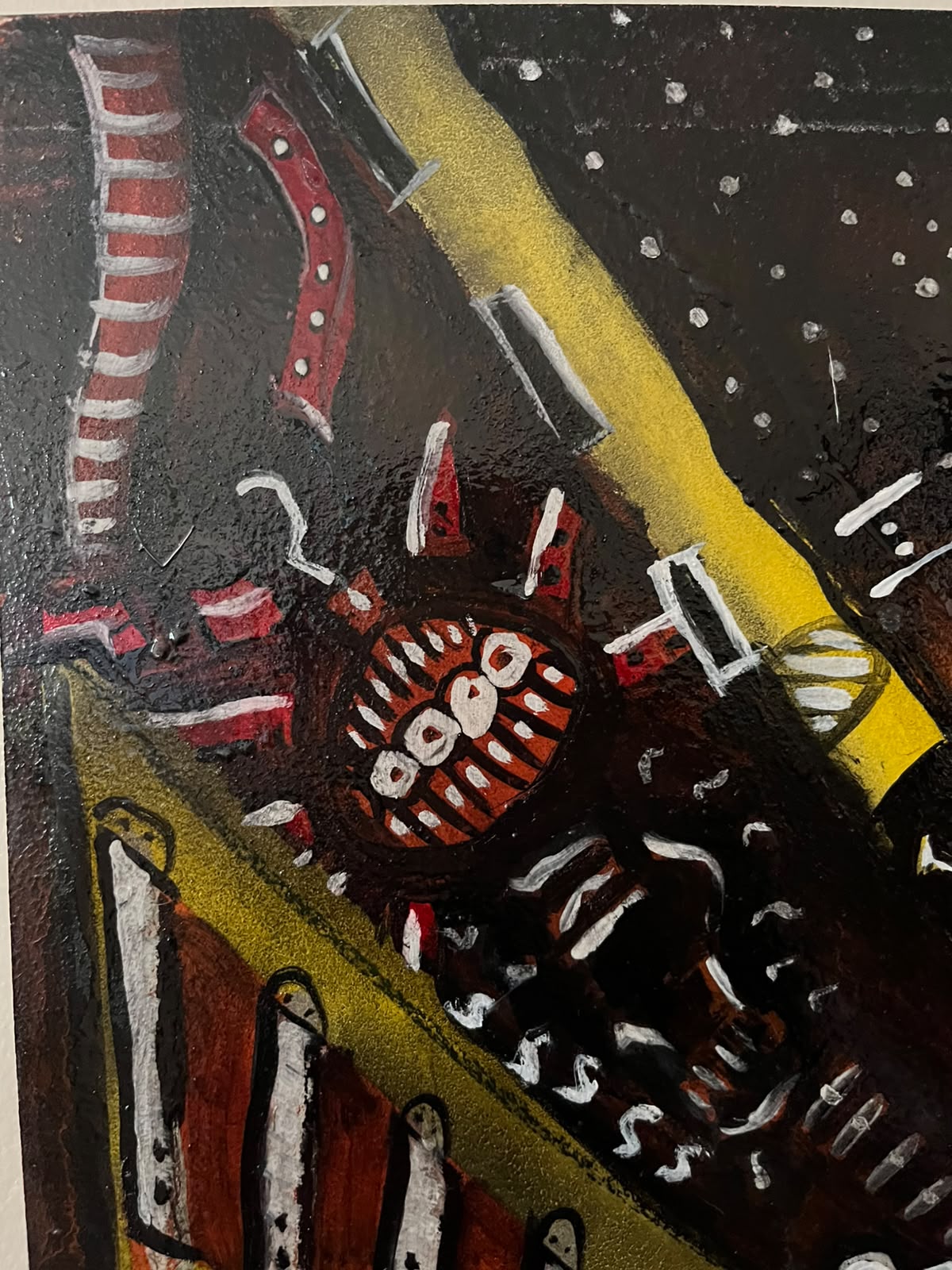 Detail — red creature crossing yellow beams under a starred sky