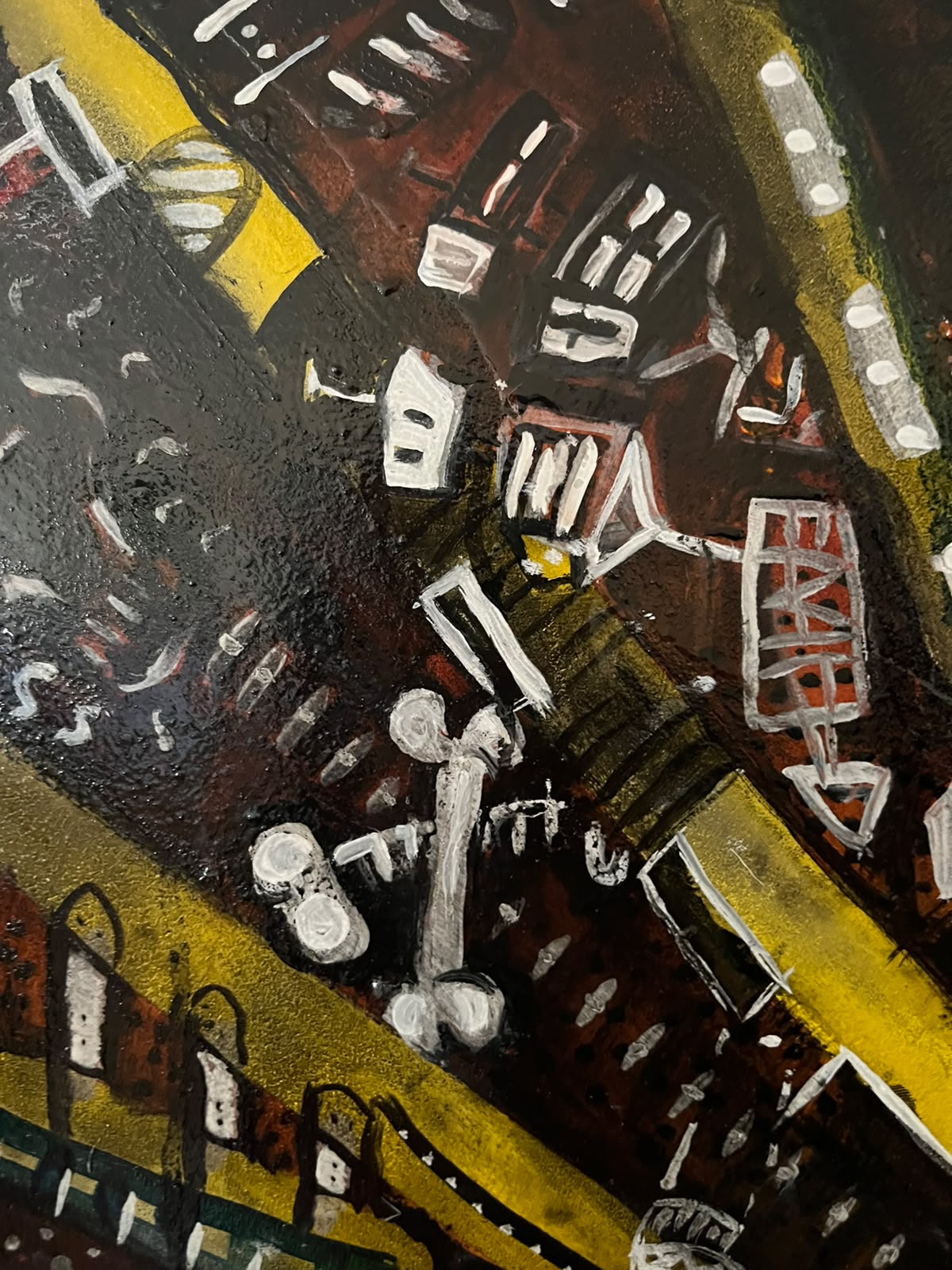 Detail — bones and beams in yellow light