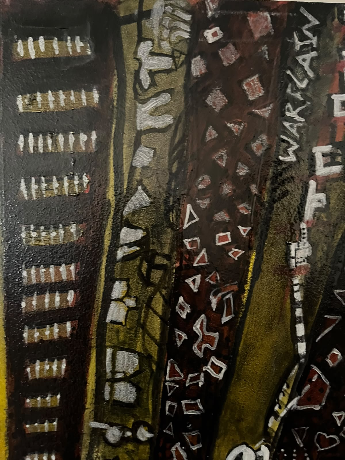 Detail — dark towers with carved white symbols
