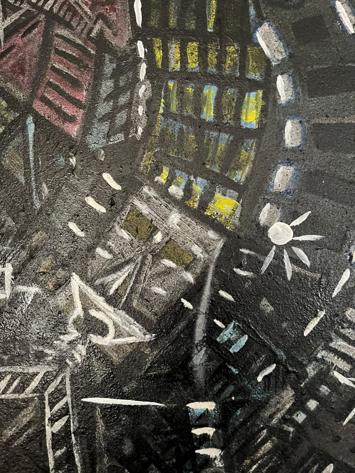 Detail — lit windows and a radiating star