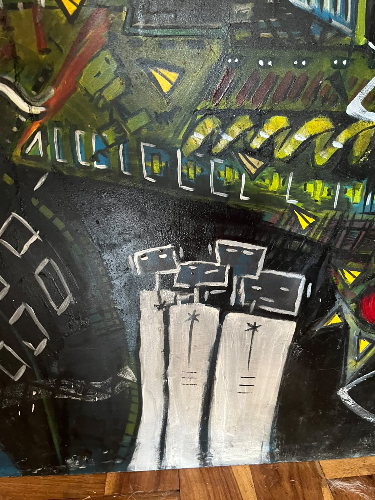 Detail — green rooftops meeting the studio floor